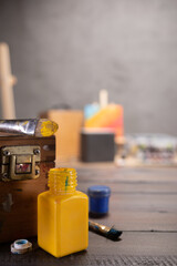 Paint brush and artist tools on wooden table. Paintbrush and art painter supplies on desk