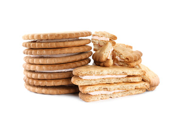 Tasty sandwich cookies with cream on white background