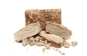 Tahini halvah, sesame paste, slices isolated on white 