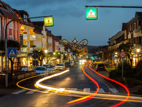 Marktstrasse Bad Sachsa in the early evening with light trails from cars, 2022-01-06, Bad Sachsa, Germany