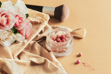 Makeup blog concept. Women's cosmetics and fashion items on a beige background with copy space. Beauty background.	