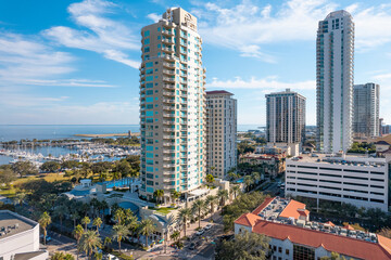 Panorama of city downtown St Petersburg Florida. Cityscape with Skyline or skyscrapers buildings. State Florida. Blue sky with clouds. Aerial photography - obrazy, fototapety, plakaty