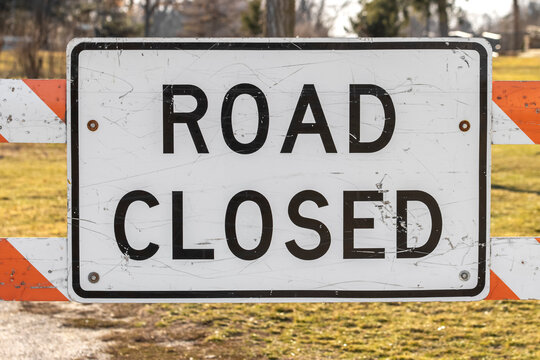 Close up shot of Road closed sign on the gate