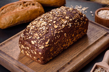 Fresh Bread on black background, top view, copy space