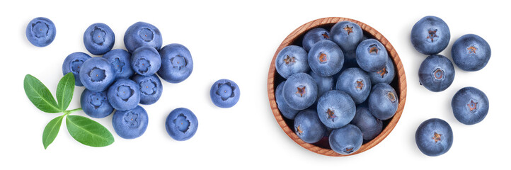 fresh ripe blueberry with leaves isolated on white background. Top view. Flat lay pattern. Set or collection