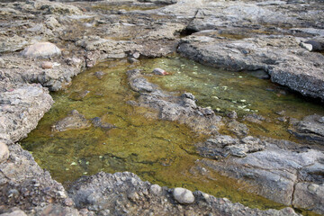 A puddle according to geological topography formed by volcanic activity