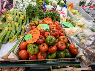 red and green tomatoes at an Italian produce market