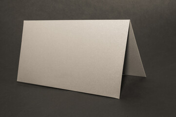 gray, silver envelope on a black flat background, luxury corporate identity and corporate identity design for layouts with the inscription hello world