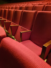 Obraz premium Empty red chairs in theater Europe Lithuania.