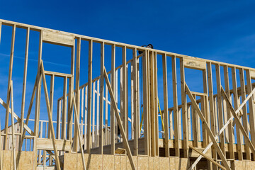 Under construction home framing exterior view of house