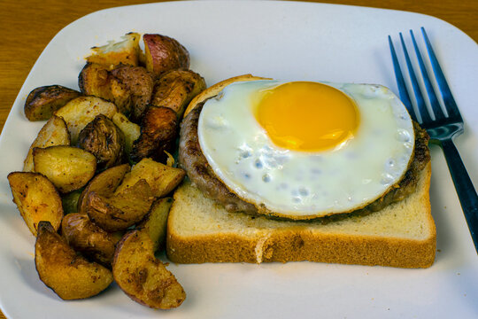 Fried Egg With Sausage Patty On Toast