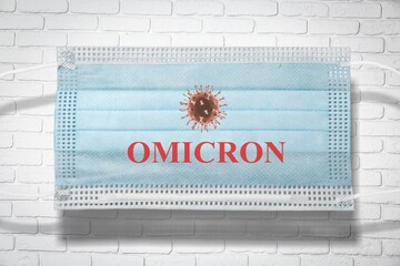 Medical face mask with - Omicron Covid-19 new variant - Omicron. Omicron variant of coronavirus