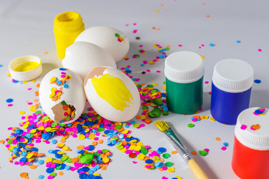White eggshells being painted and filled with confetti for carnaval celebrated in latinamerica specially in Guatemala.