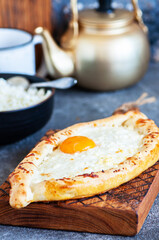 Khachapuri - traditional Georgian cheese and egg filled bread.