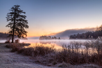 Frosty sunrise over peck's lake - 481048606
