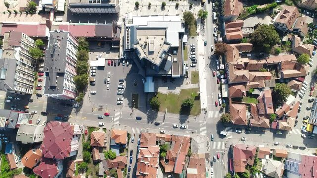 Town in southeastern Europe orthophoto top down drone shot. Pirot, Serbia. Top down shot of downtown Pirot, Serbia. Buildings, streets and central square. Aerial drone shot.