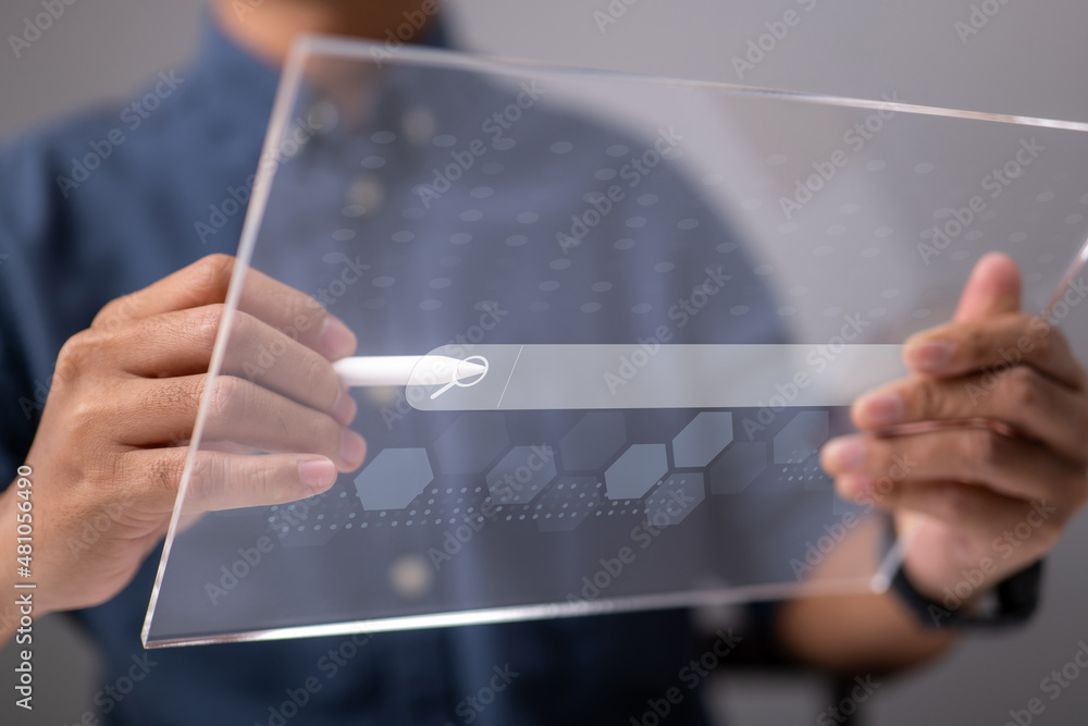 Fototapete Search Engine Optimization using Data Search Technology. A man's use tablet searching for information. Using Search Console to help you with your website.