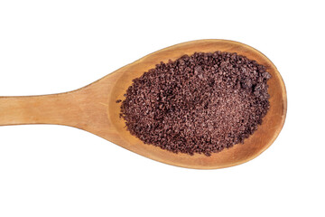 Fine brown sea salt in wooden spoon isolated