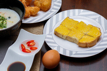 Chinese style porridge or porridge and fried dough stick or fried dough stick or donut or fried...