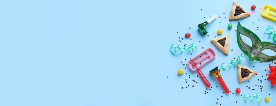 Beautiful composition for Purim celebration with space for text on blue background