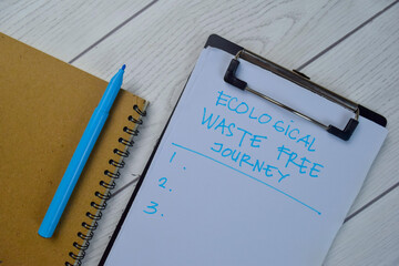 Ecological Waste Free Journey write on a paperwork and supported by additional services isolated on Wooden Table.