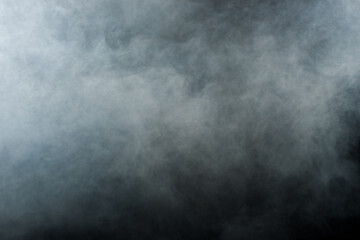 Dense Fluffy Puffs of White Smoke and Fog on Black Background, Abstract Smoke Clouds