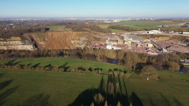 Aerial view of a stone quarry beside the orne river in normandy