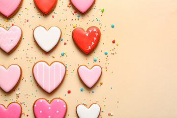 Fototapeta premium Tasty heart shaped cookies on beige background