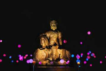 Bodhisattva buddha statue with lighting decoration