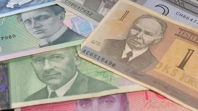 The old Estonian Kroon money bills on the table with different monetary values.close-up.4K UHD
