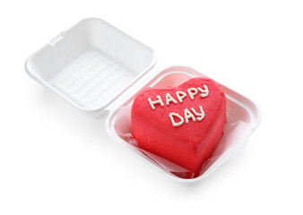 Plastic lunch box with tasty bento cake for Valentine's Day on light background