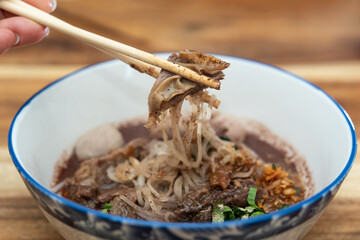 Braised beef clear noodle with meat ball soup stew