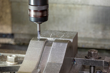 The press die manufacturing process by CNC milling machine with ball end mill tool.