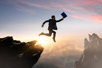 Businessman jump through the gap