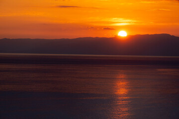 Obraz premium sunset over the river