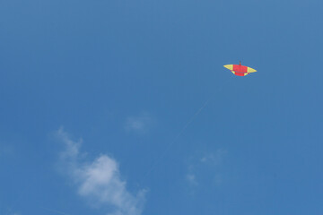 Kite flying over the blue sky 