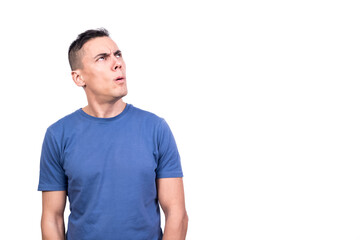Obraz premium Portrait of a man looking up with expression of doubt