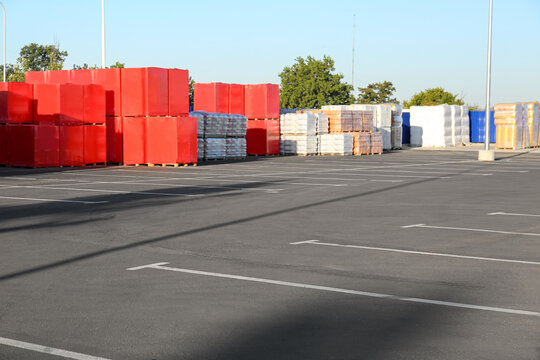 Empty parking lot near supermarket warehouse