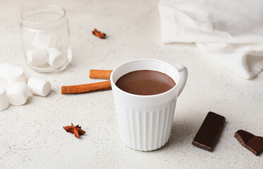 Obraz na płótnie Canvas Cup of natural hot chocolate on light background