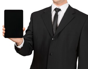 Businessman shows a touch tablet computer
