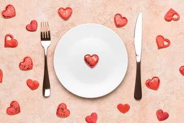 Beautiful table setting for Valentine's Day on beige background