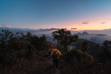 Hiking in mountains in the evening