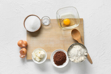 Frame made of ingredients for preparing chocolate brownie on white background