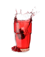 Glass of tasty pomegranate juice with splashes on white background