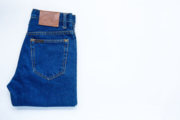 blue jeans trouser on a white background show back pocket in store and supermarket.concept fashion dress jeans.