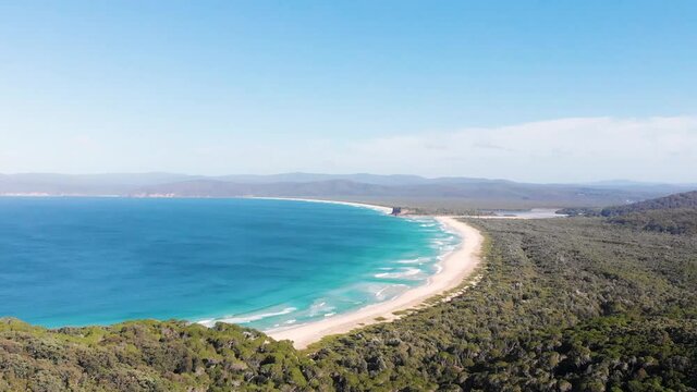 Slow Panning Drone Shot Of Wonboyn Beach Next To Ben Boyd National Park And The Australian Town of Eden. New South Wales, Australia