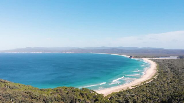 Forwards Flyin Drone Shot Of Wonboyn Beach, Showing The Crystal Clear Ocean. Next To Ben Boyd National Park And The Australian Town of Eden. New South Wales, Australia