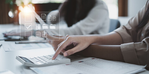 Group of Businesswoman and Accountant consulting budget and planing marketing of company in office....