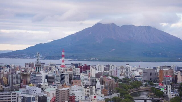Kagoshima City with Sakurajima Smoking from Eruption in the Background