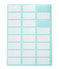 Partially used white labeling stickers with blue backing sheet, isolated on white.